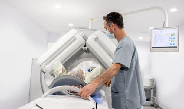 Patient undergoes a computed tomography (CT) scan