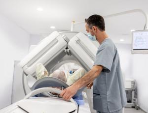 Patient undergoes a computed tomography (CT) scan